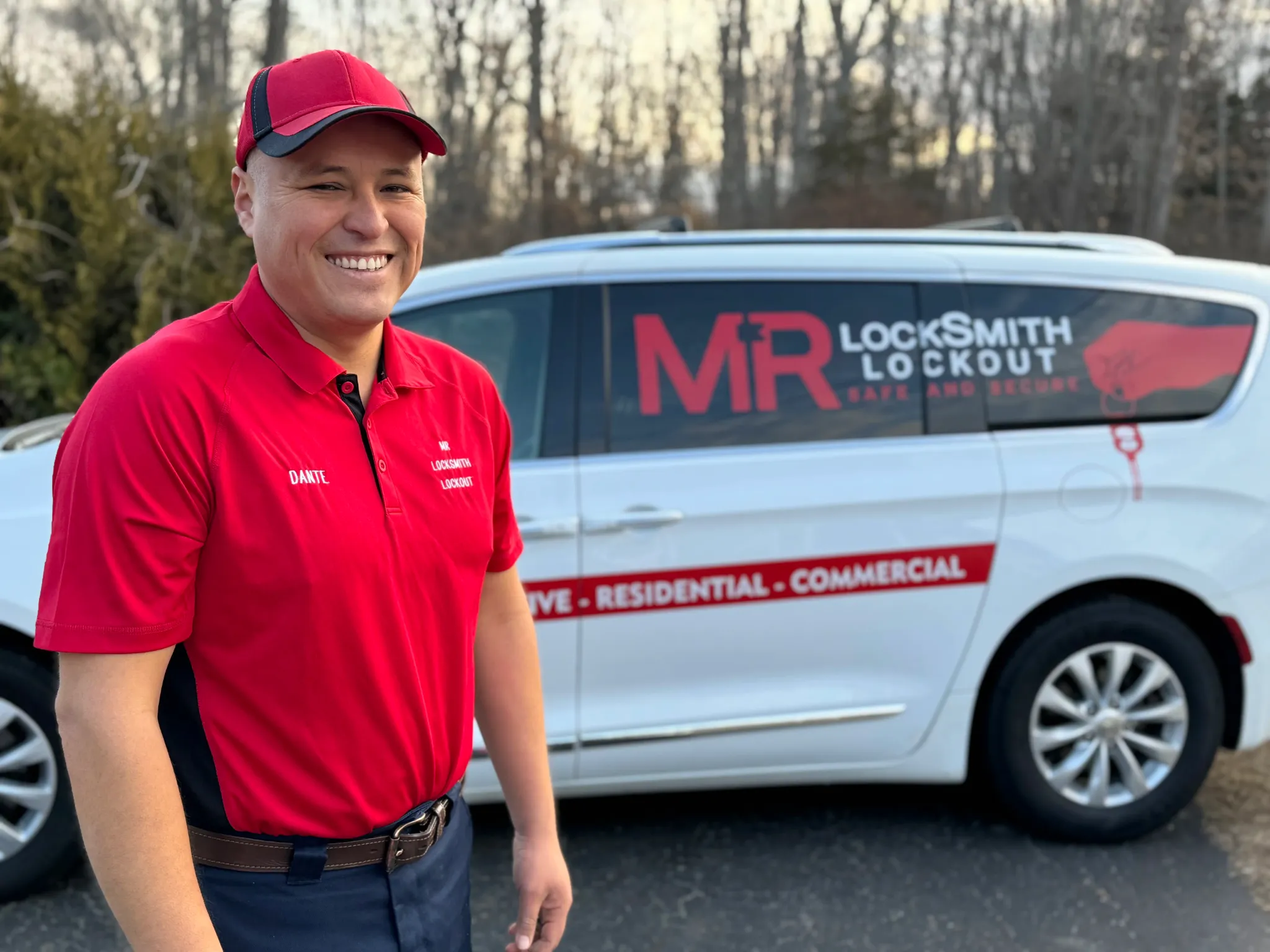Dante Salcedo standing in front of his mobile locksmith service van