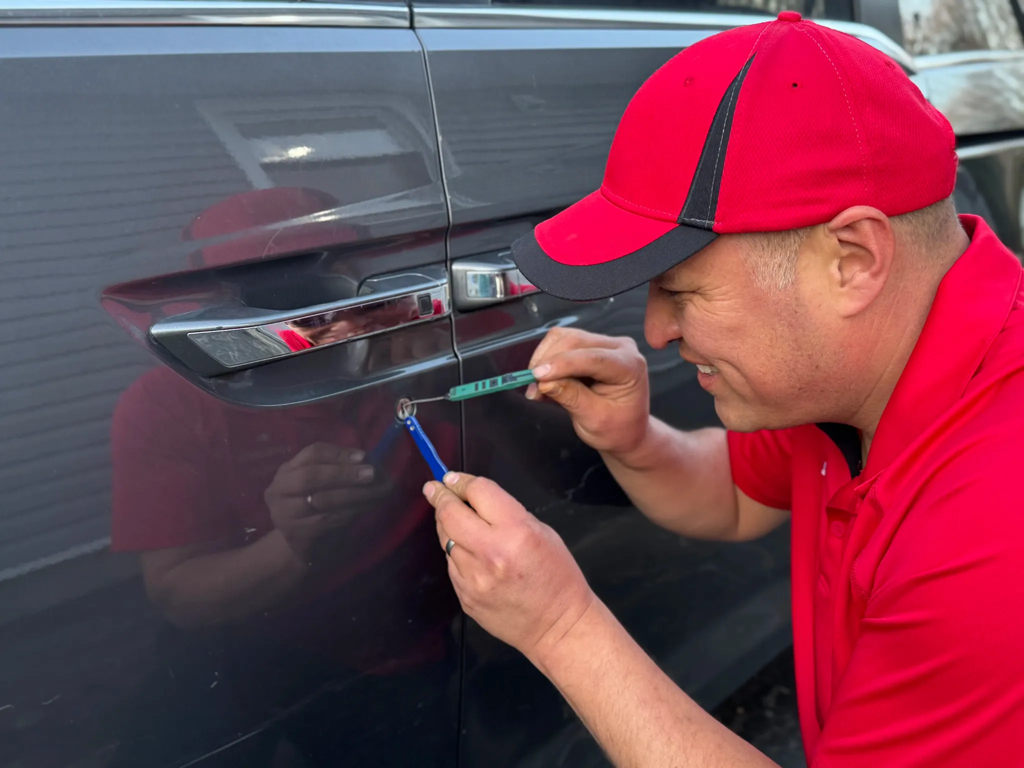 Dante Salcedo using professional lock picking tools on a vehicle