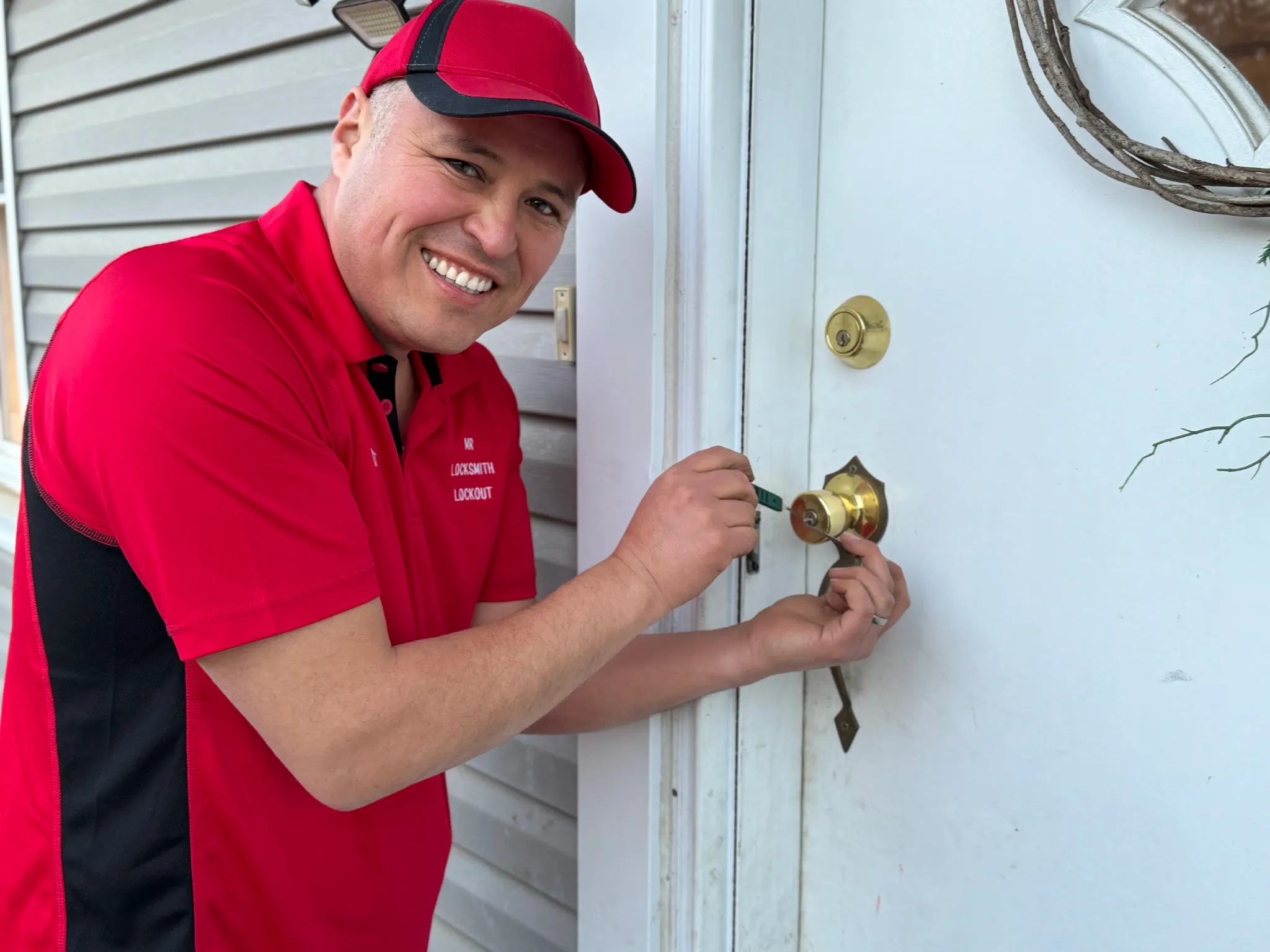 Dante Salcedo completing a residential lock repair for an Eastern Connecticut customer